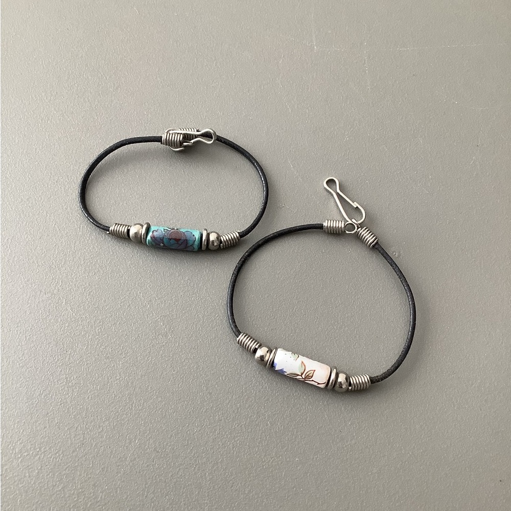 Two Bracelets Ceramic Bead Black Cord Floral